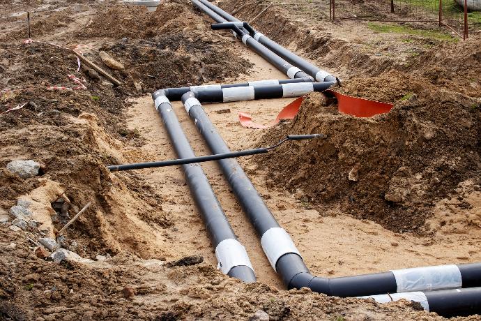 Earthworks Laying pipes in the ground